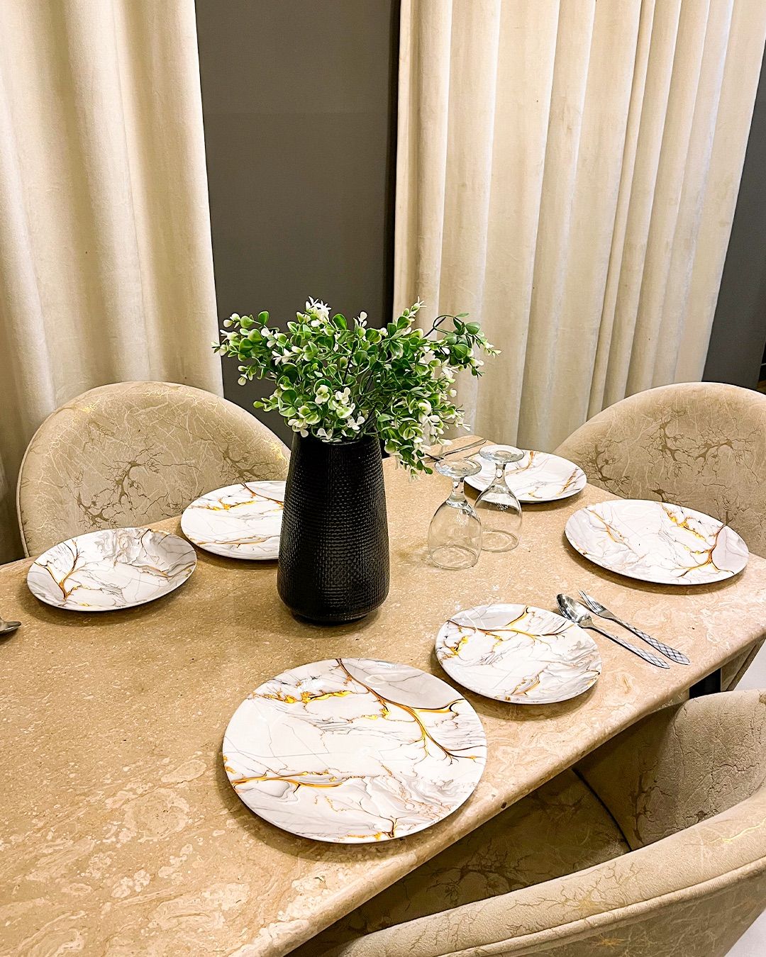 Dining table set for four